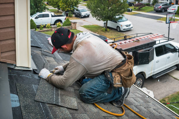 Professional Flat Roof Repair technician working in Boyne City, MI